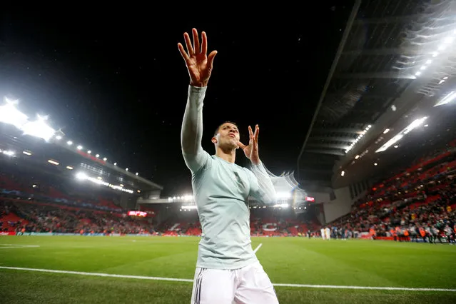 Bayern midfielder Thiago Alcantara thanks their fans after the Champions League round of 16 first leg soccer match between Liverpool and Bayern Munich at Anfield stadium in Liverpool, England, Tuesday, February 19, 2019. (Photo by Carl Recine/Action Images via Reuters)
