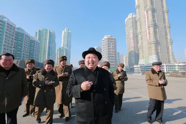 North Korean leader Kim Jong Un inspects the construction site of Ryomyong Street, in this undated photo released by North Korea's Korean Central News Agency (KCNA) on January 26, 2017. (Photo by Reuters/KCNA)