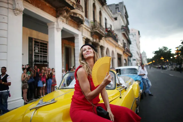 Brazilian top model Gisele Bundchen poses before a fashion show by German designer Karl Lagerfeld as part of his latest inter-seasonal Cruise collection for fashion house Chanel at the Paseo del Prado street in Havana, Cuba, May 3, 2016. (Photo by Alexandre Meneghini/Reuters)