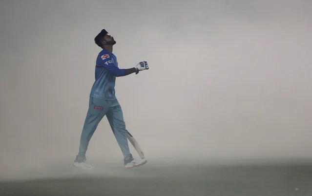 Delhi Capitals captain Shreyas Iyer walks for practice into the ground  covered with fumigation smoke, ahead of VIVO IPL cricket T20 match against Sunrisers Hyderabad in New Delhi, India, Thursday, April 4, 2019. (Photo by Altaf Qadri/AP Photo)