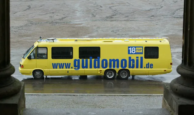 File photo of the election campaign bus of Guido Westerwelle, chairman of the German Free Democratic Party (FDP) in Mecklenburg-Vorpommern's capital Schwerin in this August 5, 2002 file photo. Westerwelle, 54, died after a long battle with cancer March 18, 2016, the Westerwelle Foundation announced on Facebook on Friday. (Photo by Tobias Schwarz/Reuters)