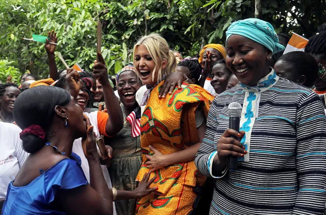 White House Advisor Ivanka Trump dances as she meets women entrepreneurs, at the demonstration cocoa farm in Adzope, Ivory Coast on April 17, 2019. (Photo by Luc Gnago/Reuters)