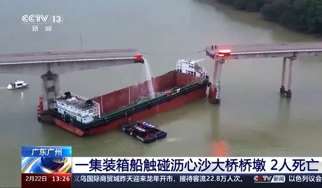 In this image from video released by China's CCTV, people inspect the broken Lixinsha Bridge after being hit by a container ship in Nansha District of Guangzhou, south China's Guangdong Province, Thursday, February 22, 2024. Few people are dead and missing after a massive container ship crashed into the bridge south of the city of Guangzhou in southern China early Thursday, causing a section of the bridge to come crashing down along with vehicles. (Photo by CCTV via AP Video)