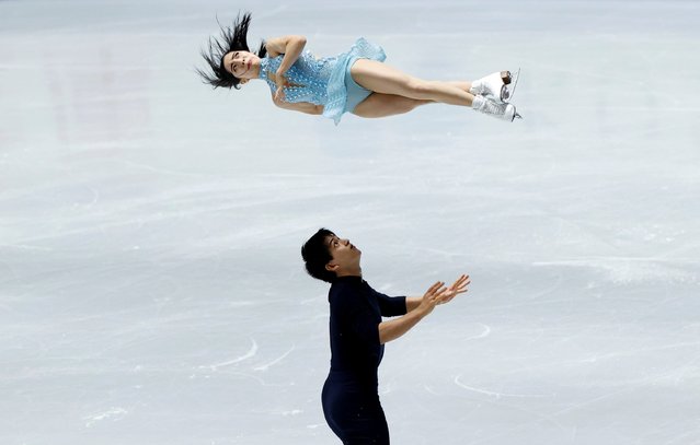 Japan's Riku Miura and Ryuichi Kihara compete in the pairs short program competition during the Grand Prix of Figure Skating NHK Trophy in Tokyo on November 12, 2021. (Photo by Issei Kato/Reuters)