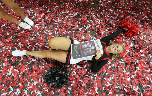 A Georgia Bulldogs cheerleader celebrates a 33-18 victory over Alabama in the 2022 NCAA National Championship football game at Lucas Oil Stadium in Indianapolis, Indiana, on Tuesday, January 11, 2022. Georgia defeated Alabama 33-18. (Photo by Aaron Josefczyk/UPI/Rex Features/Shutterstock)