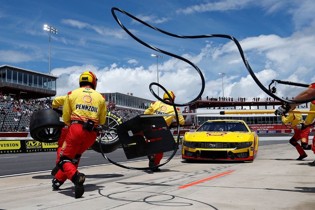 Joey Logano, driver of the #22 Shell Pennzoil Ford, pits during qualifying and pit crew challenge for the NASCAR Cup Series All-Star Race at North Wilkesboro Speedway on May 18, 2024 in North Wilkesboro, North Carolina. (Photo by Sean Gardner/Getty Images)