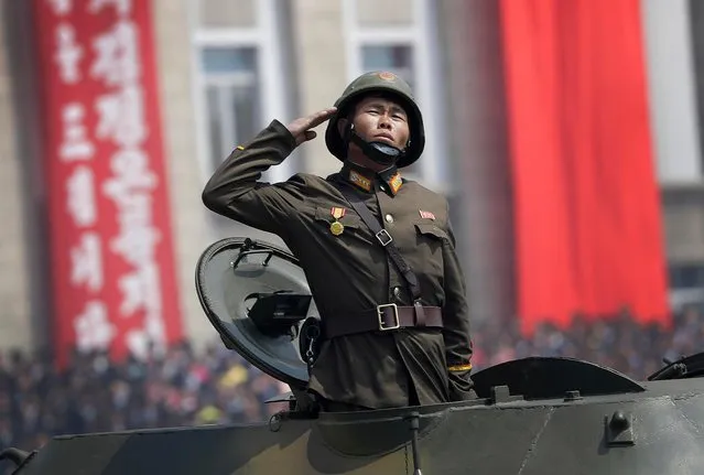 A soldier in tank takes part in a military parade on the Kim Il Sung Square Saturday, April 15, 2017, in Pyongyang, North Korea to celebrate the 105th birth anniversary of Kim Il Sung, the country's late founder and grandfather of current ruler Kim Jong Un. (Photo by Wong Maye-E/AP Photo)