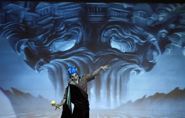 Contestant Jose Davalos performs as “Hades from Hercules” during the 41st Annual Comic-Con Masquerade costume competition on Saturday, July 11, 2015, in San Diego, Calif. (Photo by Chris Pizzello/Invision/AP Photo)