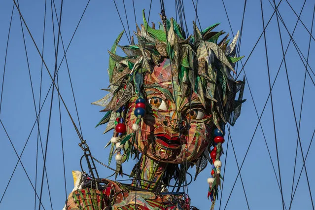 A giant puppet called MOCCO is seen during a Tokyo Olympics and Paralympics cultural event on July 17, 2021 in Tokyo, Japan. Tokyo Organising Committee of the Olympic and Paralympic Games are hosting a “Rediscover Tohoku – MOCCO's Journey from Tohoku to Tokyo” event in the Japanese garden within Shinjuku Park, the final destination of MOCCO’s journey from Tohoku to Tokyo which began in May 2021, 10 years after the Great East Japan Earthquake. MOCCO is the brainchild of children from Tohoku and was created by them in schools across the region. The puppet has collected messages from people during its journey across three of Tohoku’s prefectures – Iwate, Miyagi and Fukushima – all of which were affected by the 2011 Great East Japan Earthquake. (Photo by Yuichi Yamazaki/Getty Images)