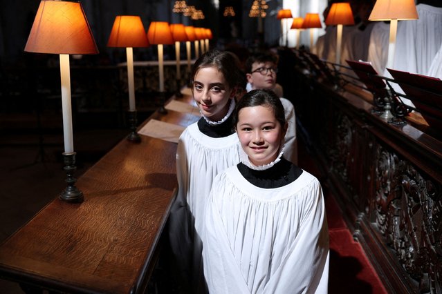 Girl choristers Lila and Lois pose for a picture as they are to become full members of the St Paul’s Cathedral Choir for the first time, in London, Britain, on June 29, 2024. (Photo by Isabel Infantes/Reuters)