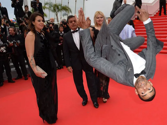 French dancer Brahim Zaibat performs as he arrives for the screening of the film “Foxcatcher” at the 67th edition of the Cannes Film Festival in Cannes, southern France, on May 19, 2014. (Photo by Alberto Pizzoli/AFP Photo)