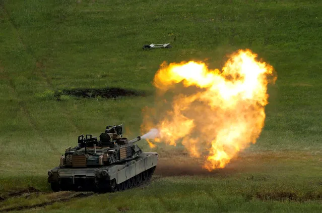 A U.S. M1A2 “Abrams” tank fires during U.S. led joint military exercise “Noble Partner 2016” in Vaziani, Georgia, May 24, 2016. (Photo by David Mdzinarishvili/Reuters)