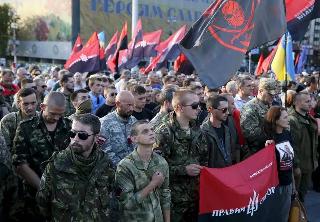 Members of the far-right radical group Right Sector and their supporters hold an anti-government rally in Kiev, Ukraine, July 21, 2015. (Photo by Gleb Garanich/Reuters)