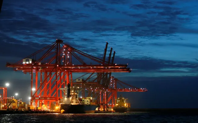 A container ship is pictured docked at the Colombo South Harbor, funded by China, in Sri Lanka June 25, 2016. (Photo by Dinuka Liyanawatte/Reuters)