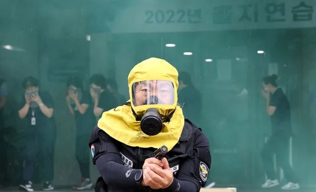 A South Korean policeman takes part in an anti-terror drill as a part of the Ulchi Freedom Guardian exercise in Sejong, South Korea on August 23, 2022. (Photo by Yonhap via Reuters)