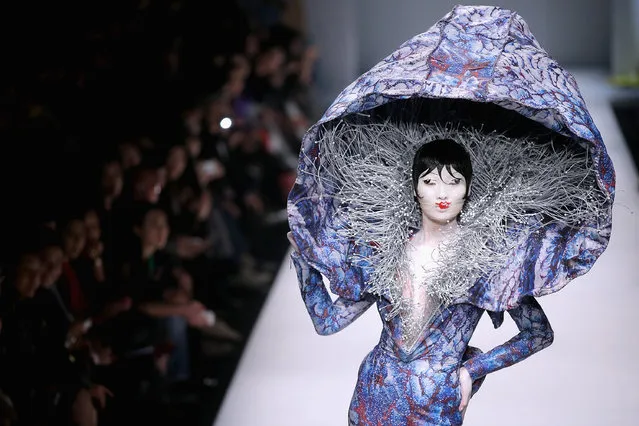 A model showcases designs on the runway at Hu Sheguang Collection show during Mercedes-Benz China Fashion Week Spring/Summer 2015 at Beijing Hotel on October 31, 2014 in Beijing, China. (Photo by Feng Li/Getty Images)