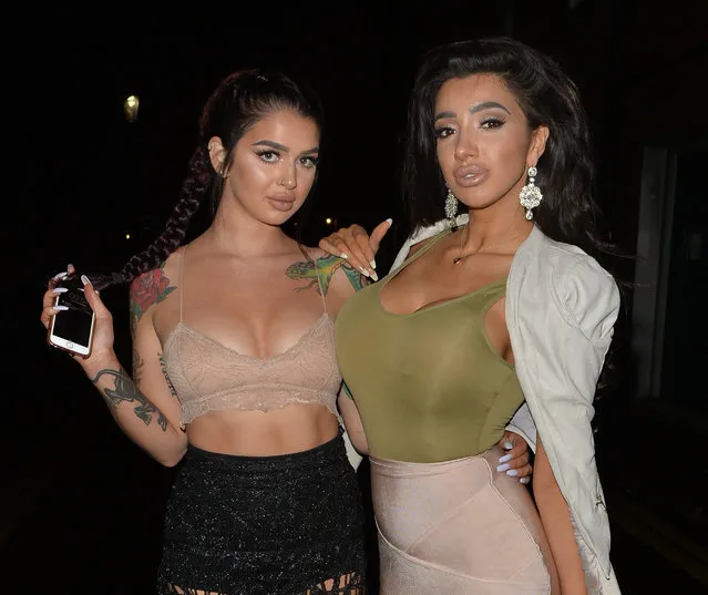 Playboy model Chloe Khan and her model friend, reality TV star Kayla Jenkins leave a restaurant and head to libertine night club in West London, UK on September 5, 2016. (Photo by Palace Lee)