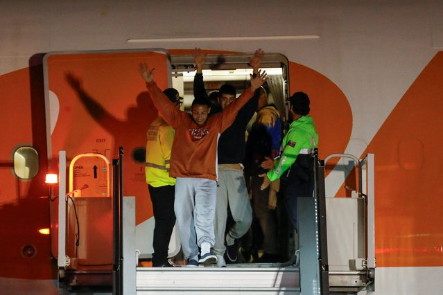 Venezuelan migrants arrive on a flight after being deported from the United States, in Caracas, Venezuela, on March 24, 2025. (Photo by Leonardo Fernandez Viloria/Reuters)