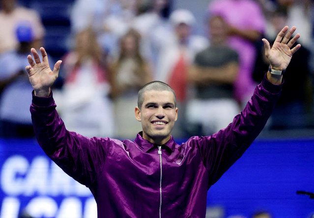 Spain's Carlos Alcaraz celebrates after winning his first round match against Reilly Opelka of the U.S. in Flushing Meadows, New York on August 26, 2025. (Photo by Jeenah Moon/Reuters)