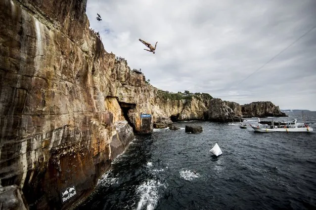 Michal Navratil of the Czech Republic dives from the 28 meter platform during the eighth stop of the Red Bull Cliff Diving World Series, Shirahama, Japan, October 16, 2016. (Photo by Dean Treml/Red Bull via Getty Images)