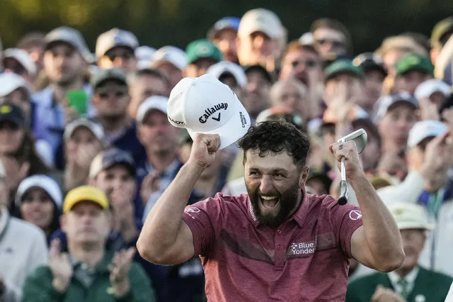 Jon Rahm, of Spain, celebrates on the 18th green after winning the Masters golf tournament at Augusta National Golf Club on Sunday, April 9, 2023, in Augusta, Ga. (Photo by Mark Baker/AP Photo)