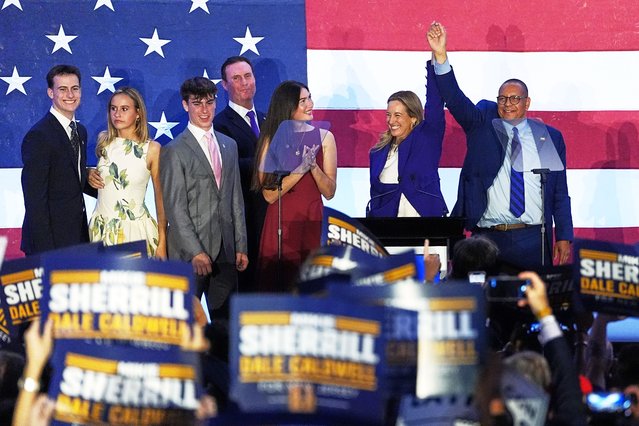 New Jersey Governor-elect Mikie Sherrill and Lieutenant Governor-elect Dale Caldwell, celebrate their victories in East Brunswick, N.J., November 4, 2025. (Photo by Matt Rourke/AP Photo)