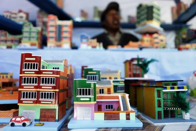 Miniature houses are displayed during the “Alasitas” fair in La Paz January 24, 2015. (Photo by David Mercado/Reuters)