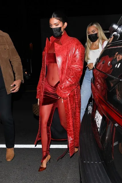 American media personality Kylie Jenner arrives in a s*xy red ensemble for Justin Bieber's album release party at The Nice Guy in West Hollywood, CA on March 25, 2021. (Photo by Backgrid USA)