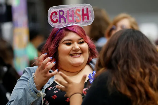 Attendees and K-pop fans participate at KCON USA, billed as the world's largest Korean culture convention and music festival, in Los Angeles, California on August 11, 2018. (Photo by Mike Blake/Reuters)