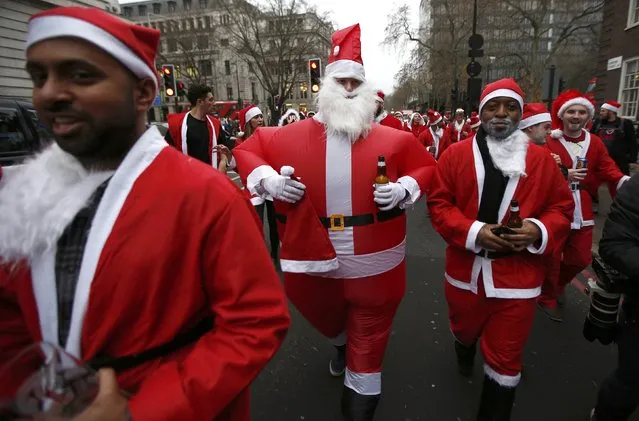 Santas take part in the Santacon event in London, Britain December 10, 2016. (Photo by Peter Nicholls/Reuters)