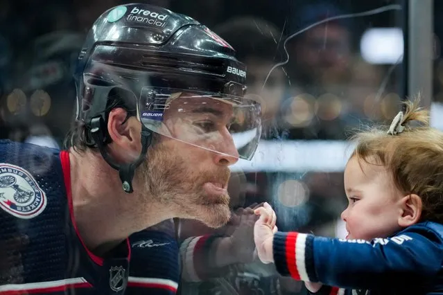 Columbus Blue Jackets defenseman Erik Gudbranson makes faces with his daughter during warmups before a game against the Philadelphia Flyers at Nationwide Arena in Columbus, Ohio on October 12, 2023. (Photo by Aaron Doster/USA TODAY Sports)