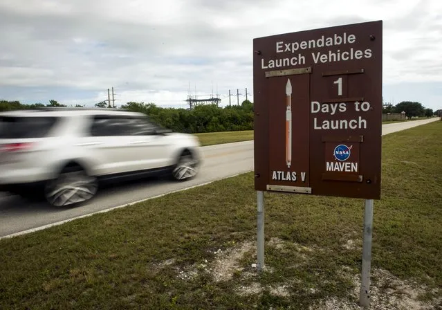 A sign along the NASA Kennedy Space Center causeway displays to passersby that there is one day remaining until the scheduled launch of the United Launch Alliance Atlas V rocket with NASA's Mars Atmosphere and Volatile Evolution (MAVEN) spacecraft onboard from Cape Canaveral Air Force Station Space Launch Complex 41, Sunday, Nov. 17, 2013, in Cape Canaveral, Fla. (AP Photo/NASA, Bill Ingalls)