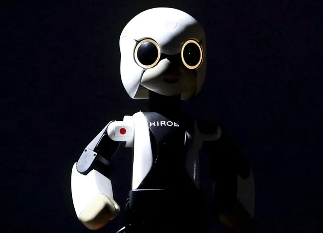 Humanoid communication robot Kirobo appears on stage during a return debriefing session from the International Space Station to Japan, in Tokyo in this March 27, 2015 file photo. (Photo by Yuya Shino/Reuters)