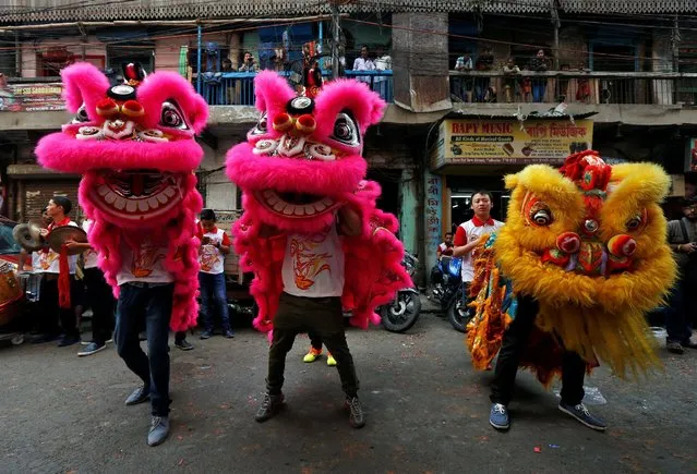 Members of the Chinese community perform a lion dance as they take part in celebrations to mark the Chinese Lunar New Year in Kolkata, India, January 28, 2017. (Photo by Rupak De Chowdhuri/Reuters)