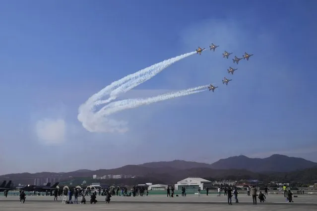 South Korean Air Force's Black Eagles aerobatic team performs during the press day of the Seoul International Aerospace and Defense Exhibition 2021 at the Seoul Military Airport in Seongnam, South Korea, Monday, October 18, 2021. The event will be held from Oct. 19 to Oct. 23 with many other affiliated events. (Photo by Ahn Young-joon/AP Photo)