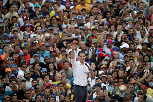 Venezuelan opposition leader Juan Guaido, who many nations have recognised as the country's rightful interim ruler, takes part in a rally during his visit in Maracaibo, Venezuela, April 13, 2019. (Photo by Ueslei Marcelino/Reuters)