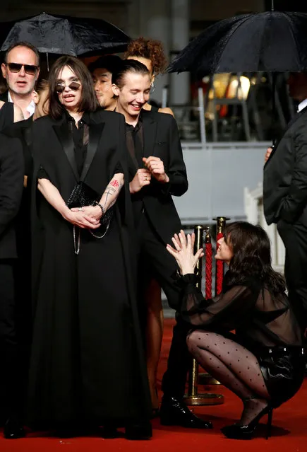French actress Beatrice Dalle, French model and actor Paul Hameline and French actress and singer Charlotte Gainsbourg (Bottom) arrive for the screening of the film “Lux Aeterna” at the 72nd edition of the Cannes Film Festival in Cannes, southern France, on May 18, 2019. (Photo by Jean-Paul Pelissier/Reuters)