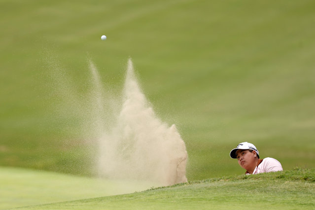 Pavarisa Yoktuan of Thailand plays a shot from a bunker on the fourth hole during the first round of the JM Eagle LA Championship presented by Plastpro at Wilshire Country Club on April 25, 2024 in Los Angeles, California. (Photo by Harry How/Getty Images)