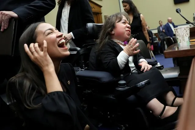 U.S. Representative Alexandria Ocasio-Cortez (D-NY) speaks with Maria Isabel Bueso after her testimony about her ongoing medical care in the U.S. at a House Oversight and Reform Civil Rights and Civil Liberties Subcommittee hearing on U.S. President Donald Trump's administration changes to Medical Deferred Action policies for critically ill children, on Capitol Hill in Washington, U.S. September 11, 2019. (Photo by Jonathan Ernst/Reuters)
