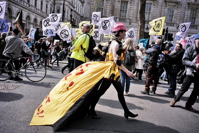 Extinction rebellion and other campaign groups continued with their fourth and last days of planned protest in London on April 24, 2023. Whilst warning the government that they would “step up” their action if they don't accept the two climate change demands. The campaigners are demanding; the end to all licences, funding and approval for new oil and gas projects and create “emergency citizens assemblies” to tackle the climate crisis. (Photo by Aubrey Fagon/Alamy Live News)