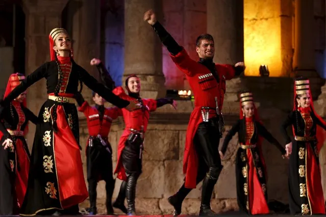 Dancers from the Al-Jeel Al-Jadeed Circassian Folklore Dance Troupe perform during the Jerash Festival in Jordan's ancient town of Jerash, Jordan, July 28, 2015. (Photo by Muhammad Hamed/Reuters)