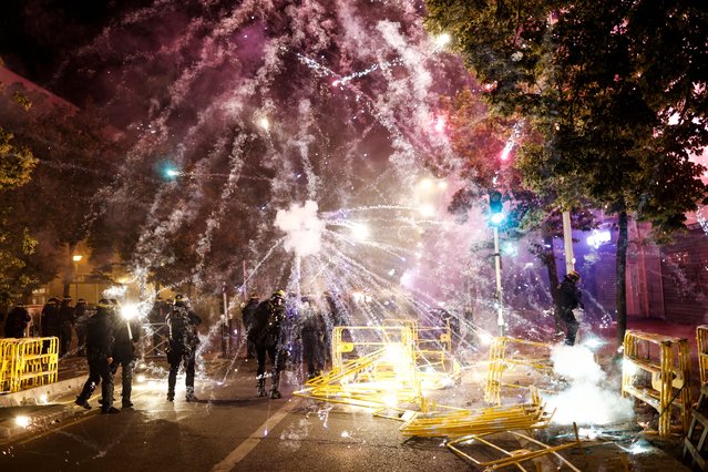 Protesters throw fireworks at riot police during clashes in Nanterre, near Paris, France, 29 June 2023. Violence broke out after police fatally shot a 17-year-old during a traffic stop in Nanterre on 27 June 2023. According to the French interior minister, 31 people were arrested with 2,000 officers being deployed to prevent further violence. (Photo by Yoan Valat/EPA/EFE/Rex Features/Shutterstock)