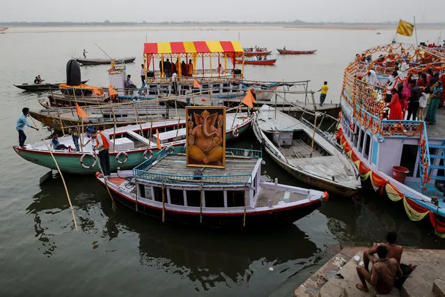 A portrait of Hindu god Ganesh, the deity of prosperity, is seen on a boat on the banks of the river Ganges in Varanasi, India, April 5, 2017. (Photo by Danish Siddiqui/Reuters)