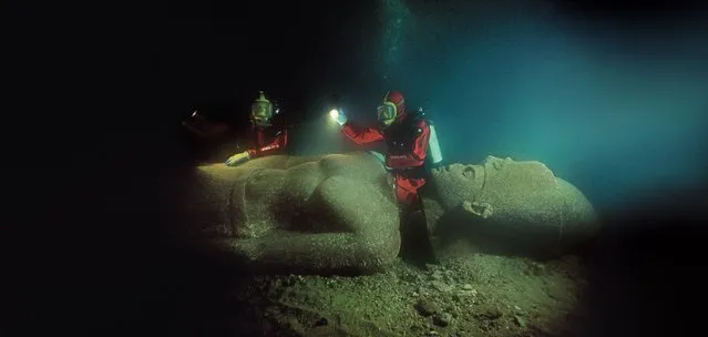 A five-metre pharaoh found at Naukratis’s sister port, Thonis-Heracleion. Heracleion also known as Thonis was an ancient Egyptian city near Alexandria whose ruins are located in Abu Qir Bay, currently 2.5 km off the coast, under 10 m (30 ft) of water. Its legendary beginnings go back to as early as the 12th century BC, and it is mentioned by ancient Greek historians. Its importance grew particularly during the waning days of the Pharaohs – the late period, when it was Egypt's main port for international trade and collection of taxes. (Photo by Christoph Gerigk/Franck Goddio/Hilti Foundation)