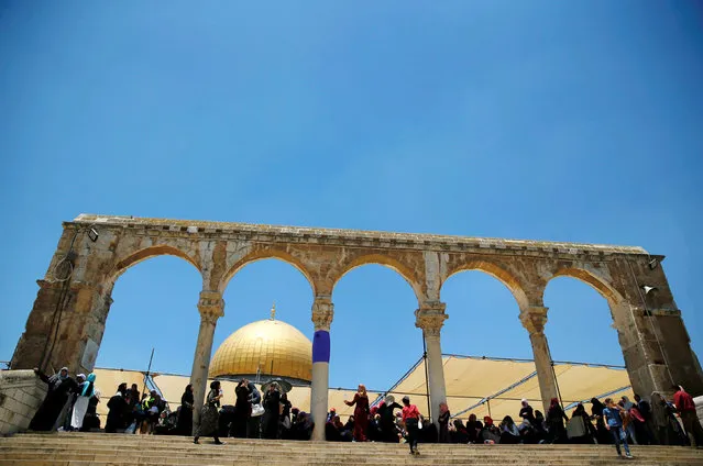 Palestinians pray on the last Friday of the holy fasting month of Ramadan on the compound known to Muslims as Noble Sanctuary and to Jews as Temple Mount in Jerusalem's Old City July 1, 2016. (Photo by Ammar Awad/Reuters)