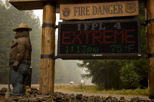 A sign board at the McKenzie River Ranger Station makes clear the fire danger level in the Willamette National Forest, Wednesday, September 6, 2017 in Blue River, Ore. Several fires are burning in the area. (Photo by Andy Nelson/The Register-Guard via AP Photo)