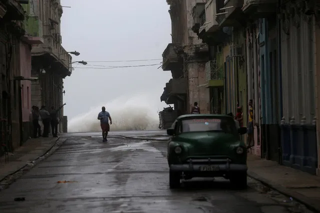 Waves crash on the street as Hurricane Irma turns toward the Florida Keys on Saturday, in Havana, Cuba September 9, 2017. (Photo by Reuters/Stringer)