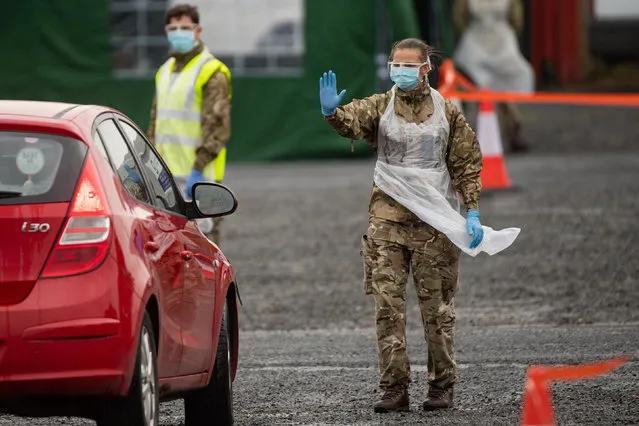 Members of the military man a Covid-19 testing centre in Hereford on April 29, 2020, as the UK continues in lockdown to help curb the spread of the coronavirus. (Photo by Jacob King/PA Images via Getty Images)