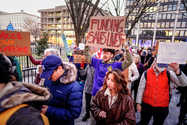 People gather during a rally in support of federal funding and in opposition to U.S. President Donald Trump's order to pause all federal grants and loans, near the White House in Washington, U.S., January 28, 2025. (Photo by Ken Cedeno/Reuters)