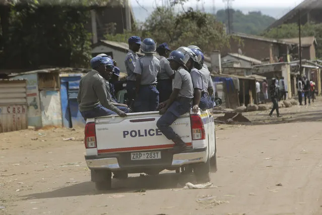 Zimbabwean police patrol the streets of Harare, Zimbabwe, Monday, March, 30, 2020. (Photo by Tsvangirayi Mukwazhi/AP Photo)